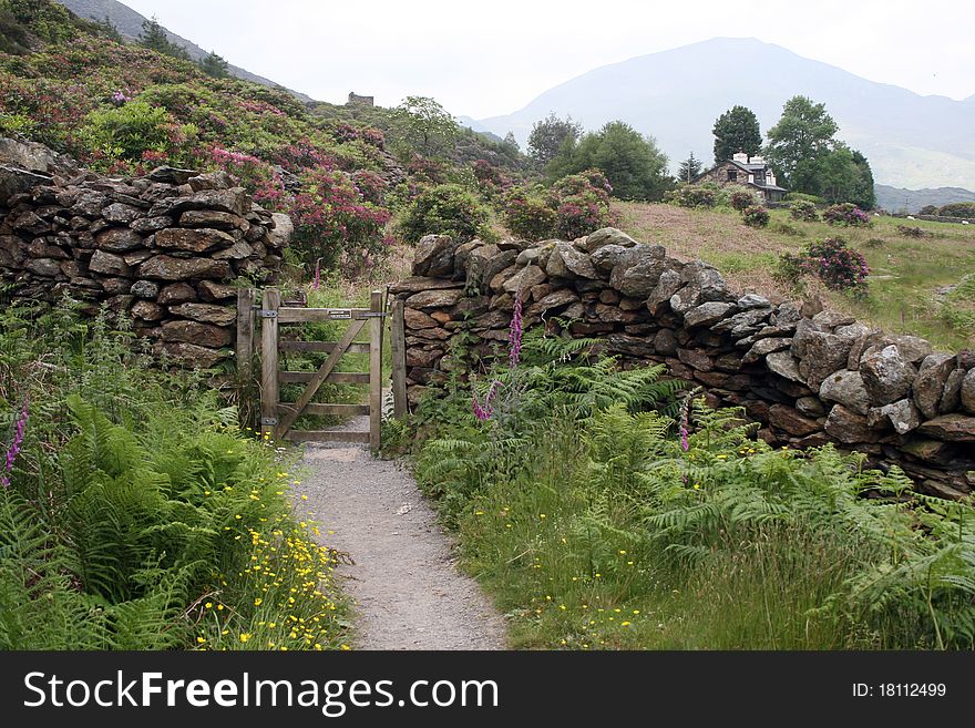 Gate on path Llyn Dinas Valley, Snowdonia in North Wales. Gate on path Llyn Dinas Valley, Snowdonia in North Wales