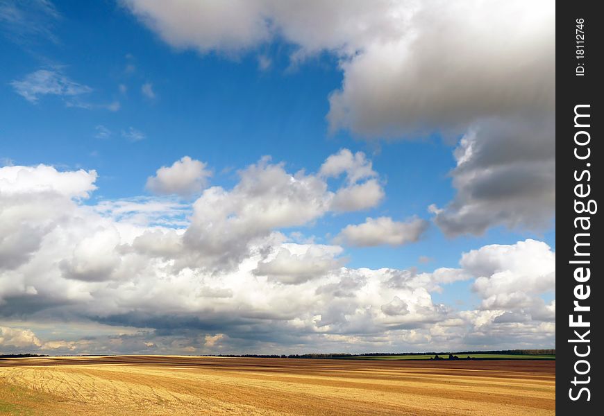 Mown wheat field and a beautiful sky