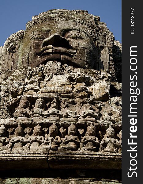 A bayon face at Angkor, Siem Reap, Cambodia. A bayon face at Angkor, Siem Reap, Cambodia.