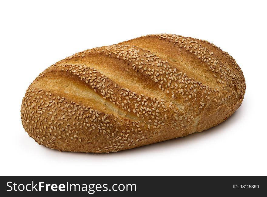 Loaf of  fresh wheat  bread, isolated on white background.