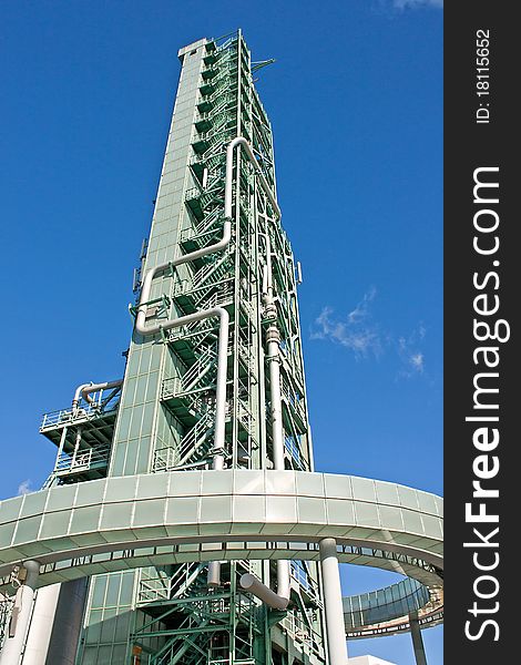 Burning tower of Fuel gas with blue sky as background