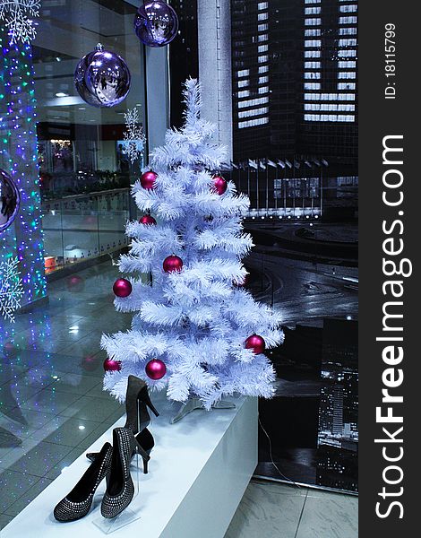 Decoration with Christmas symbols of showcase mall in the winter. Decoration with Christmas symbols of showcase mall in the winter
