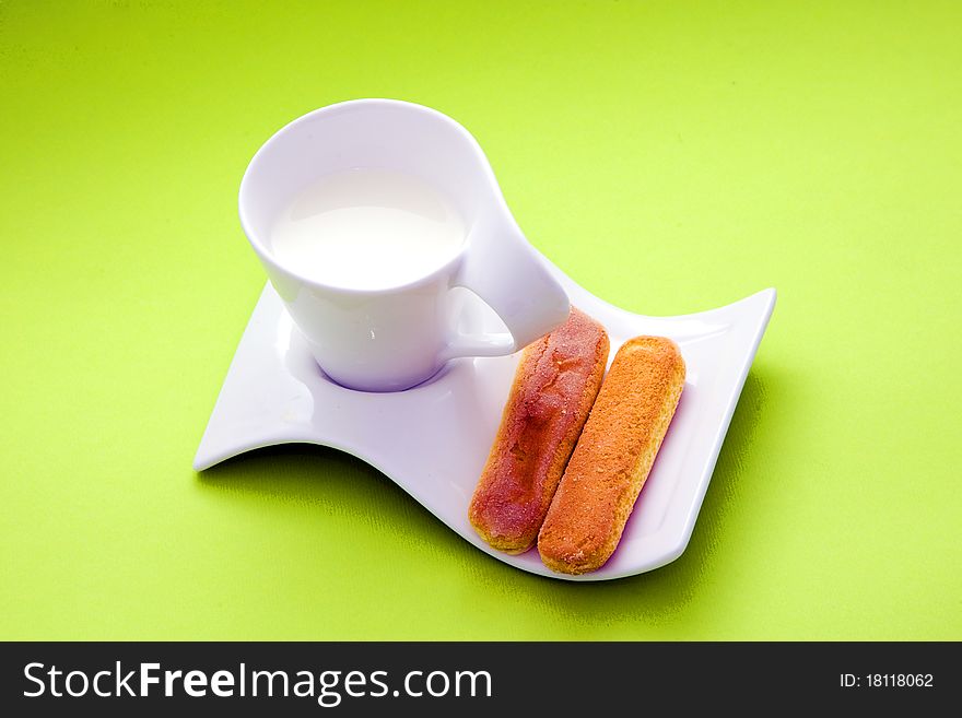 Cup with milk and crakers