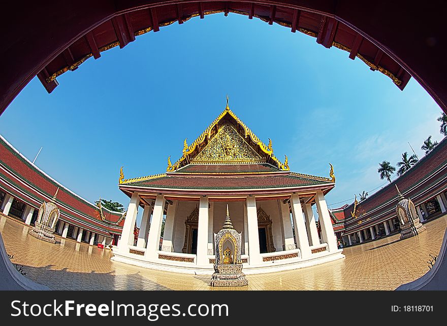 Ancient buddha temple in Bangkok nice bright blue sky background
