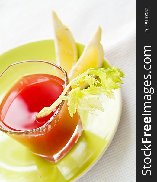 Fresh tomato juice or Bloody Mary with celery