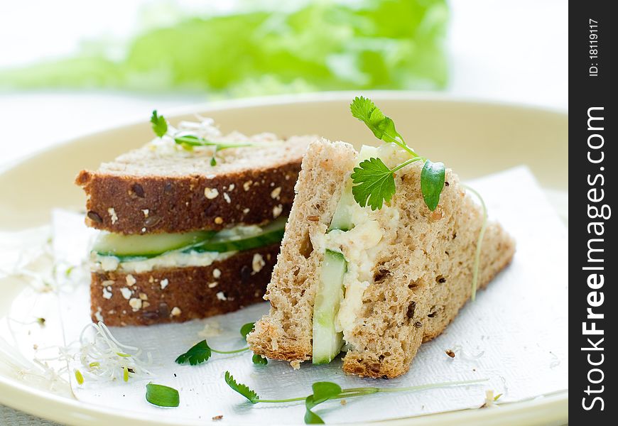 Healthy sandwich with fresh cucumber and egg for breakfast