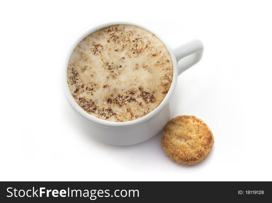 White Cup of coffee with small cookie isolated on white background. White Cup of coffee with small cookie isolated on white background