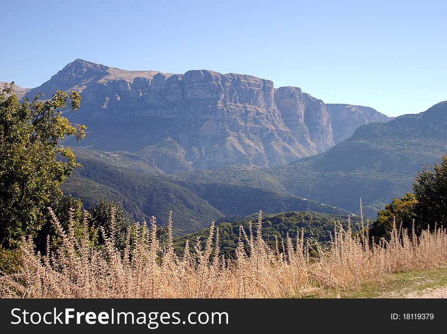 A scenic landscape view of the Vikos Gorge in Greece. A scenic landscape view of the Vikos Gorge in Greece.
