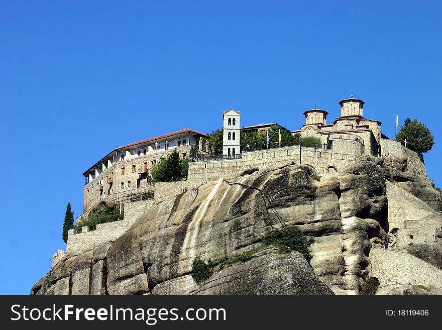 A monastary built into the cliffs in the ancient Meteora in Greece. A monastary built into the cliffs in the ancient Meteora in Greece.