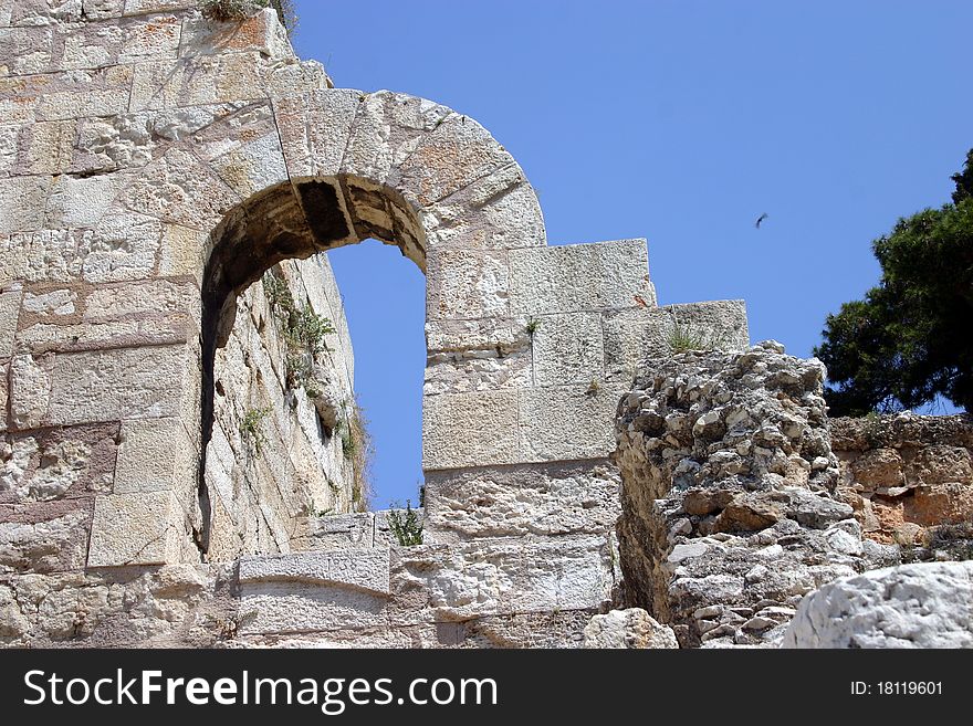 A set of arches at the ancient site of Acropolis in Athens, Greece. A set of arches at the ancient site of Acropolis in Athens, Greece.