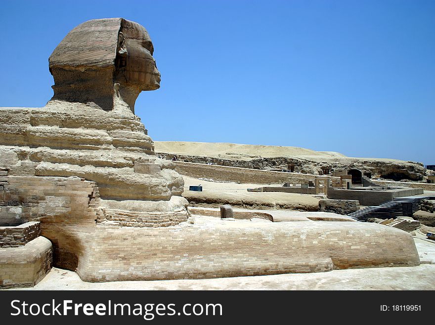 The Sphinx found in Cairo, Egypt with desert and pyramids in the background. The Sphinx found in Cairo, Egypt with desert and pyramids in the background.