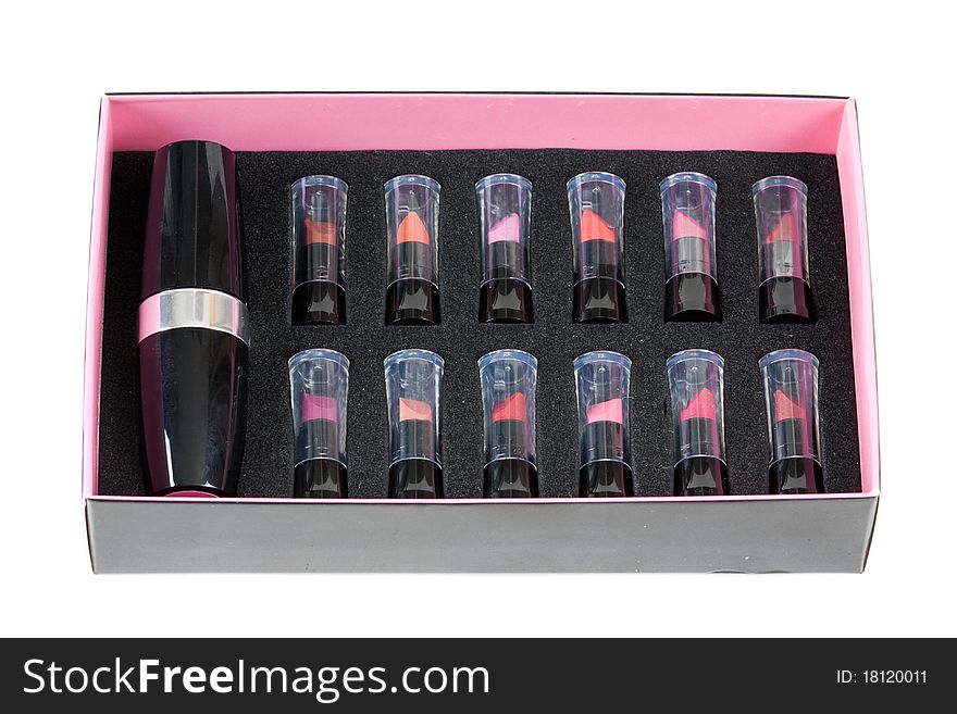 Collection of women's lipsticks in a black box