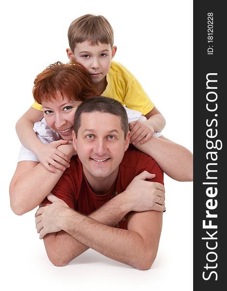 Mom and Dad and son lying on a white background