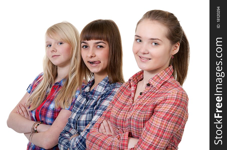 Three young beautiful girlfriends on a white background