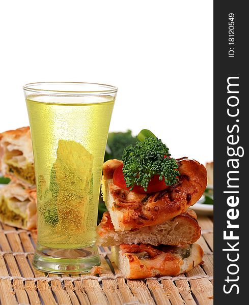 Pizza slices with carbonated water over wooden background. Pizza slices with carbonated water over wooden background.