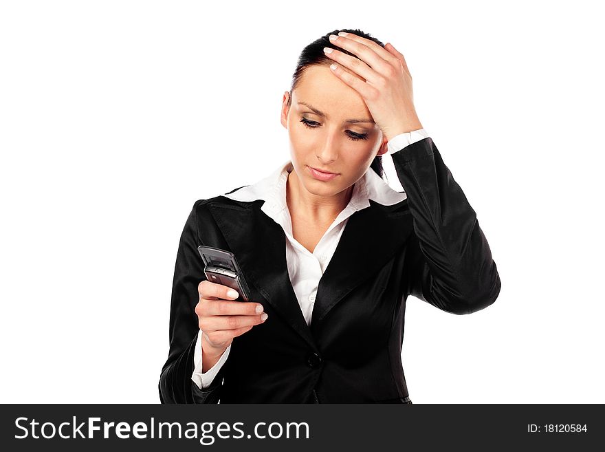 Depressed businesswoman reads the message on cellphone. Isolated on white background. Depressed businesswoman reads the message on cellphone. Isolated on white background