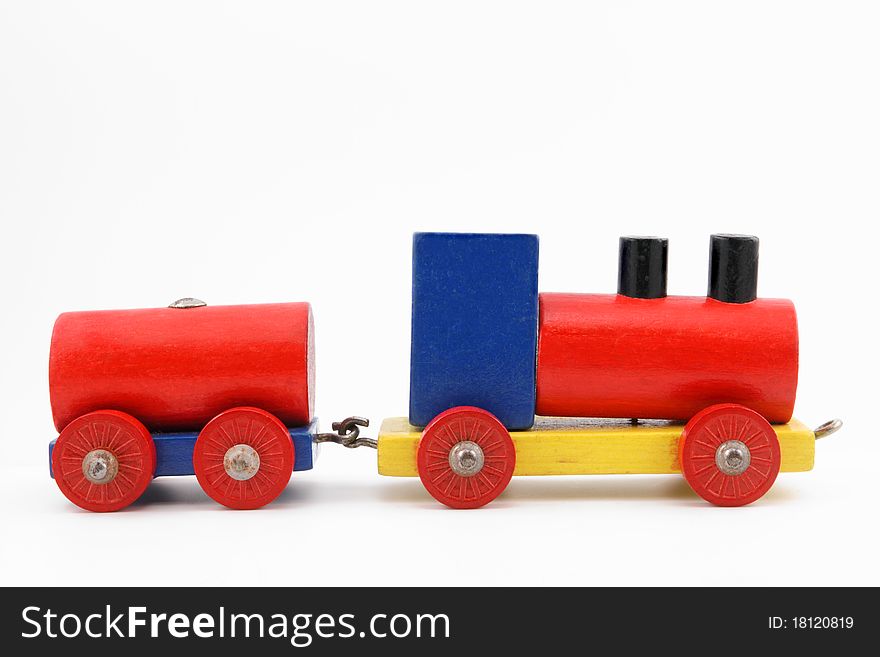 Colorful miniature wooden toy train on white background. Colorful miniature wooden toy train on white background