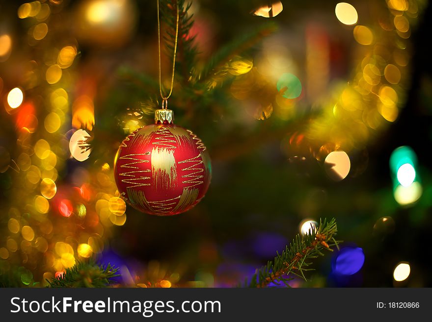 Beautiful Christmas ball on the tree - Defocused
