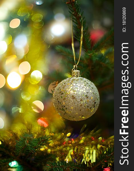 Beautiful Christmas ball on the tree - Defocused
