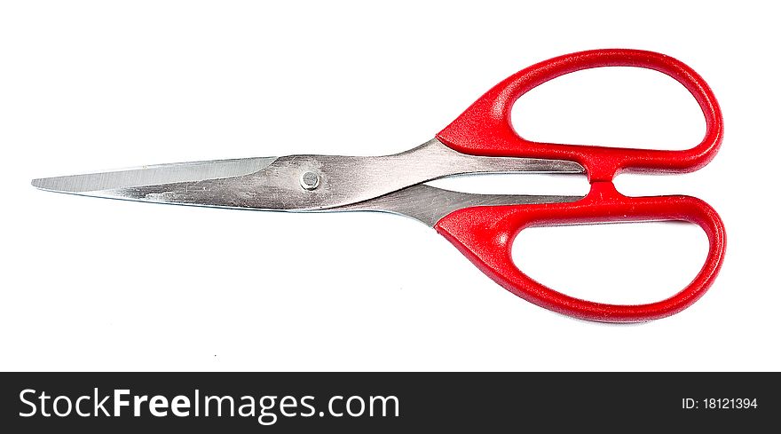 Red scissors isolated on white
