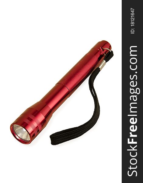 Red metallic flashlight isolated on white background. Red metallic flashlight isolated on white background