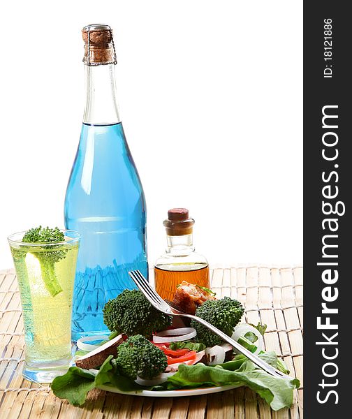 Veggie salad with drinks isolated on white background. Veggie salad with drinks isolated on white background.