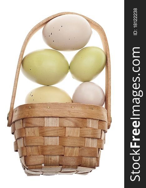 Speckled Easter Eggs in a Basket Isolated