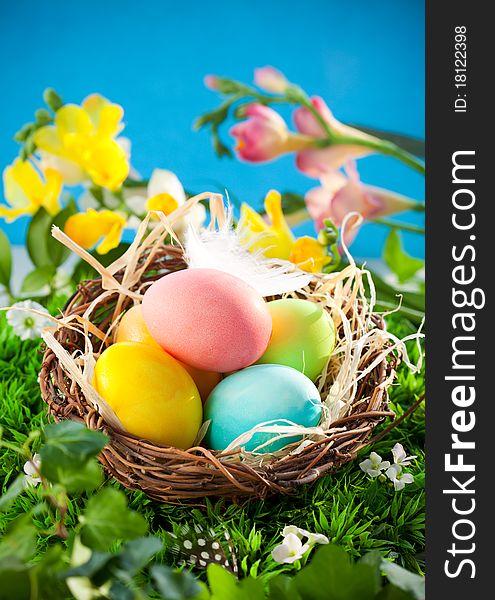 Colorful Easter Eggs In A Nest