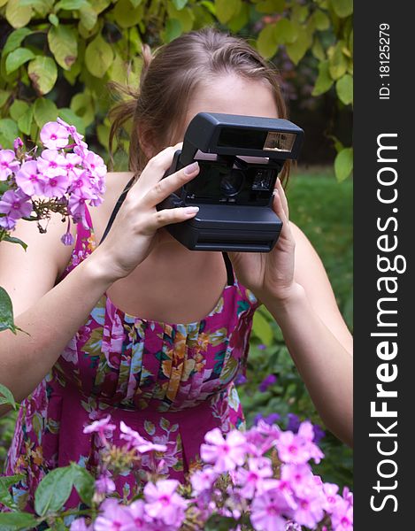 Girl With Old-fashioned Camera