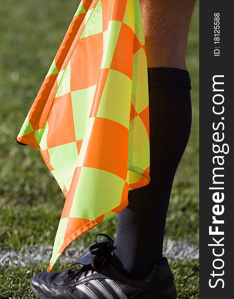 In professional soccer there are two linesmen whose job it is to call off sides, throw-ins and help the referee make decisions. Carrying a flag to signal their observations, linesmen must monitor the sidelines and goal lines and flag if the ball goes out of play, signaling which team the goal kick or throw-in should be awarded to.

A key aspect of their job is deciding whether a ball has crossed t. In professional soccer there are two linesmen whose job it is to call off sides, throw-ins and help the referee make decisions. Carrying a flag to signal their observations, linesmen must monitor the sidelines and goal lines and flag if the ball goes out of play, signaling which team the goal kick or throw-in should be awarded to.

A key aspect of their job is deciding whether a ball has crossed t