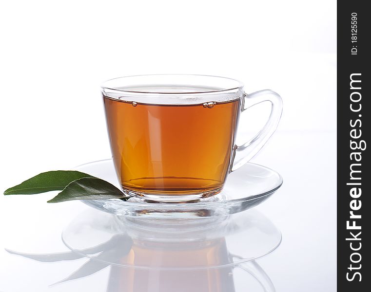 Cup of tea on white background