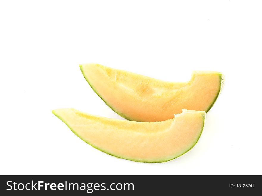 Two slices of fresh cantaloupe isolated on white background. Two slices of fresh cantaloupe isolated on white background
