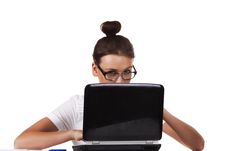 Woman With Glasses Sits And Working On Laptop Stock Photography