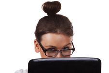 Woman With Glasses Sits And Working On Laptop Royalty Free Stock Photo