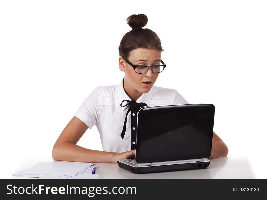 Woman with glasses sits and working on laptop A series of office work