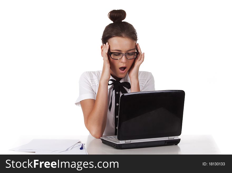 Woman with glasses sits and working on laptop A series of office work