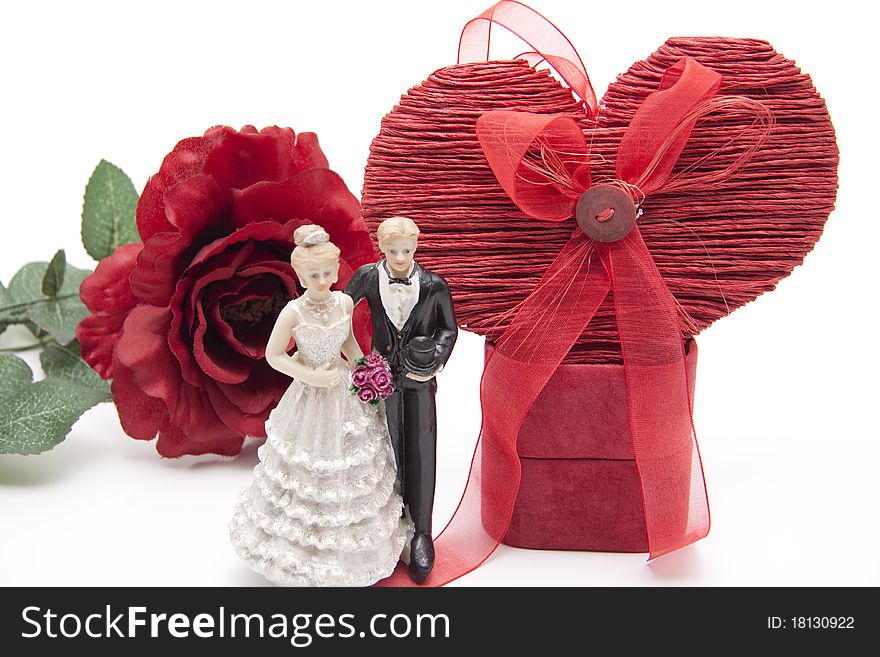 Heart with bridal couple and red rose