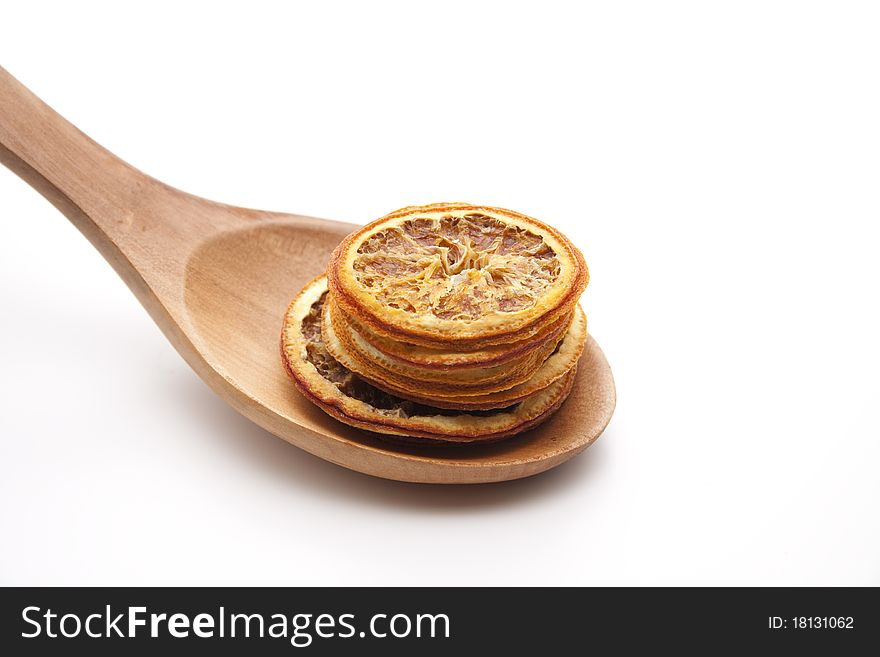 Lemon cut onto wooden spoons