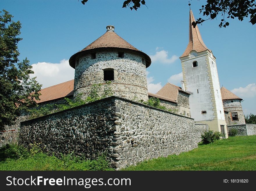 Fortified church with defense wall. Racos, Romania