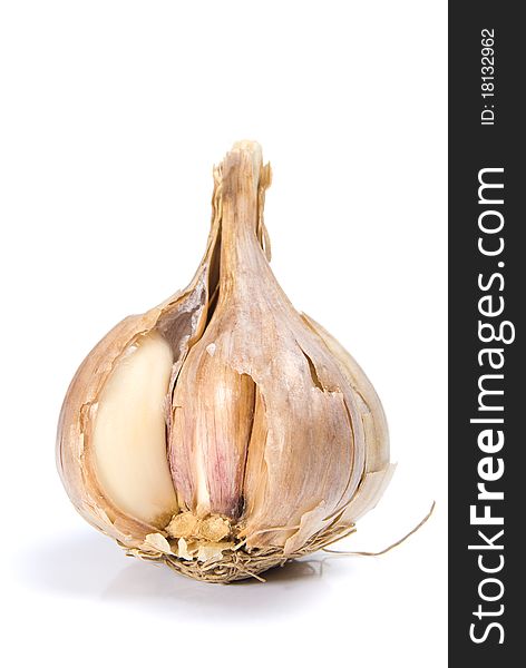 The garlic is solated on a white background