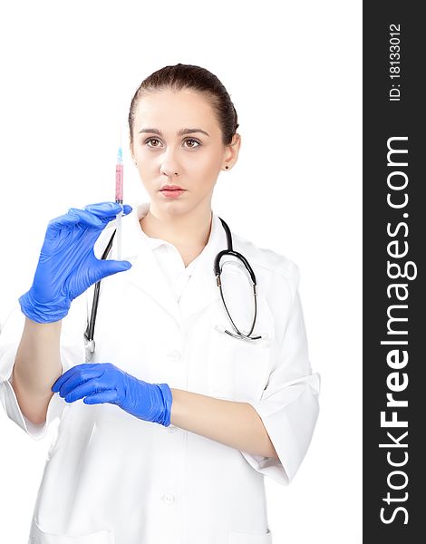 Young working beautiful woman doctor in uniform