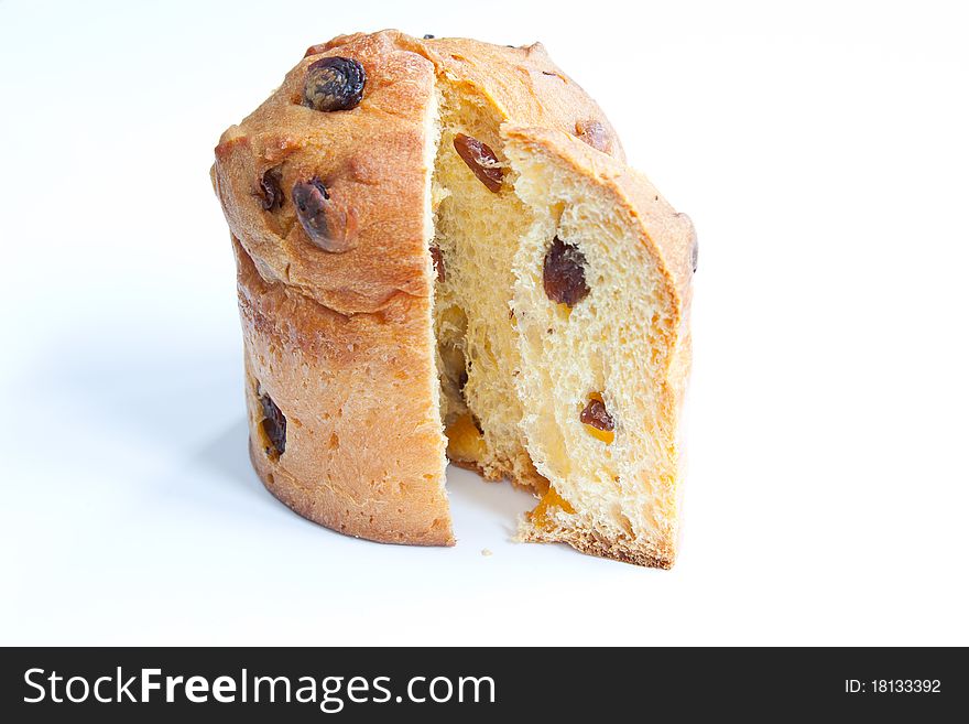 A traditional Italian mini panettone, sliced to show the dried fruit & candied peel.