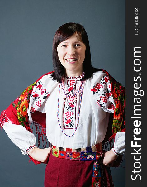 Young ukrainian woman in traditional dress smiling