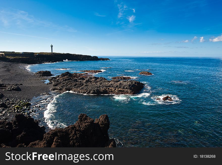 The lighthouse at the Coast of La Bombilla, La Palma, Canary islands, Spain. The lighthouse at the Coast of La Bombilla, La Palma, Canary islands, Spain