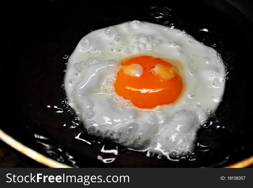 Smiled Fried Egg in a pan