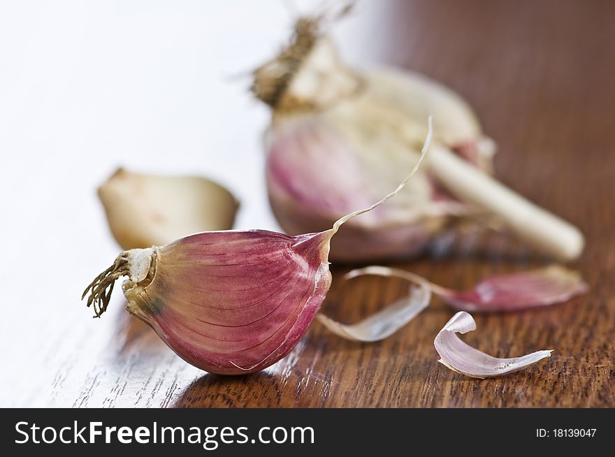 Garlic on wood table closeup