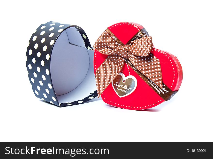 Gift Box Shaped Red Heart on a white background. Gift Box Shaped Red Heart on a white background.