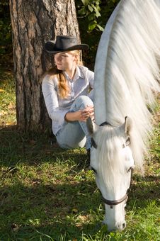 Young Woman With Her Horse Stock Photography