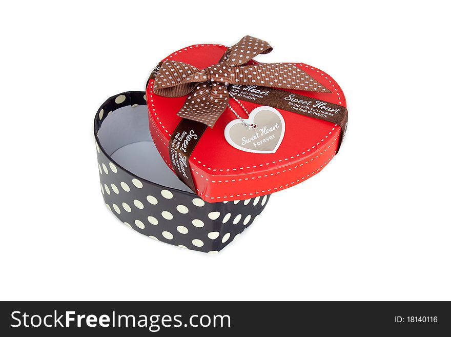 Gift Box Shaped Red Heart on a white background. Gift Box Shaped Red Heart on a white background.