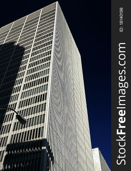 This modern highrise building is located in downtown Detroit, Michigan. This modern highrise building is located in downtown Detroit, Michigan.